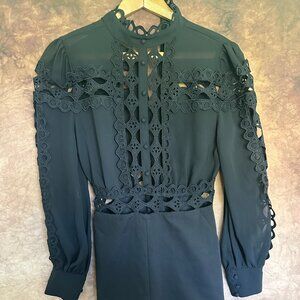 Black Banjul Romper Size Medium with Cutout Details and Mesh Amazing Collar